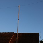 Fibreglass mast with antenna